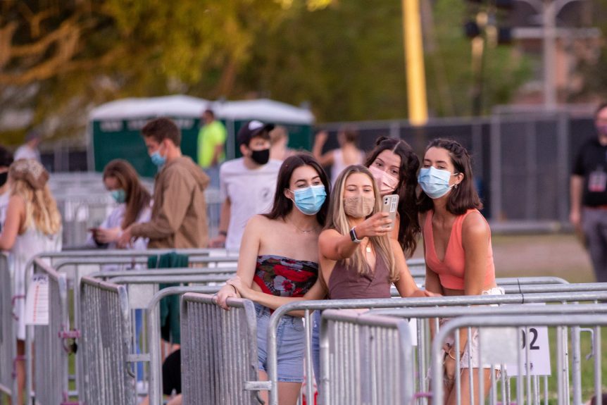 Students wearing masks outside